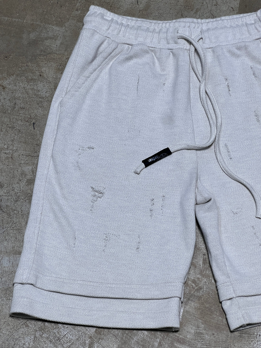 UG SHORTS (Off-White)